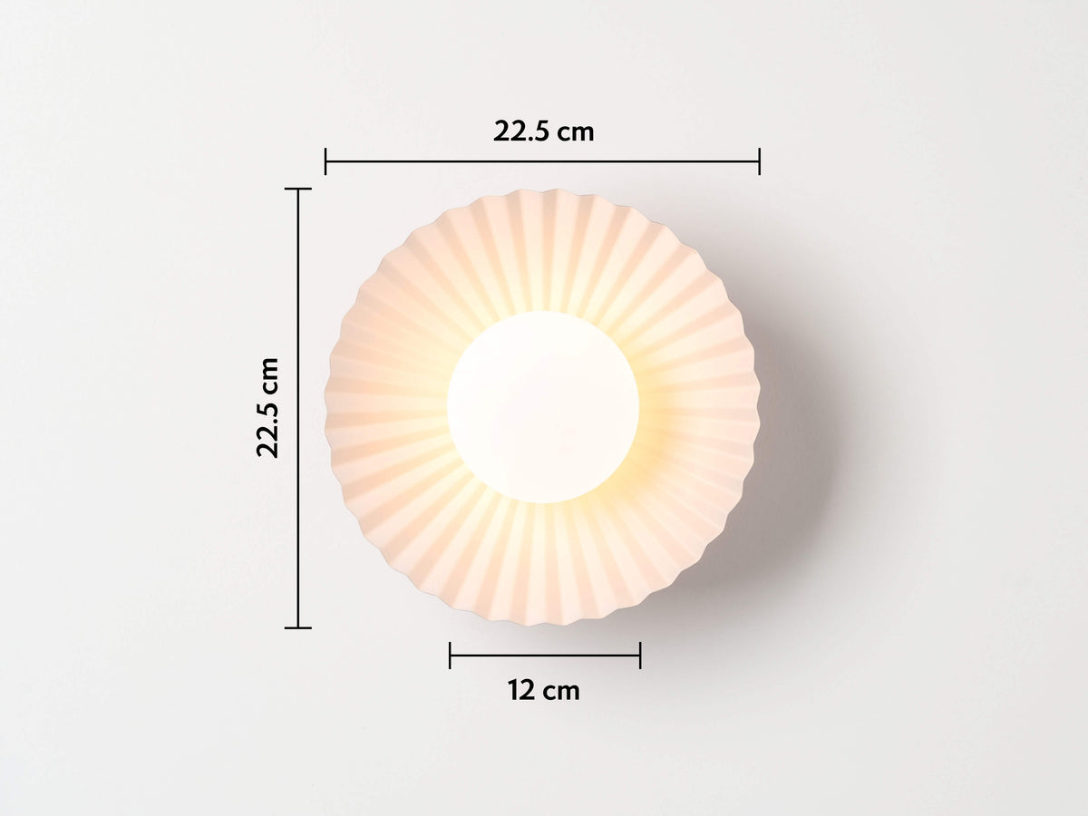 Burnt orange flush pleat wall light