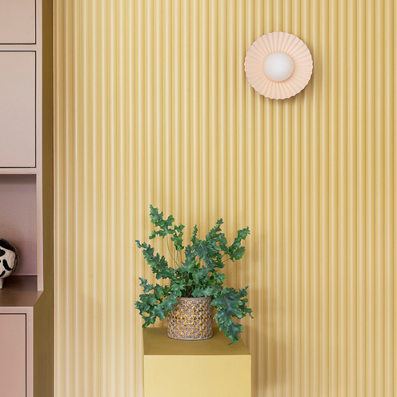 Burnt orange flush pleat wall light